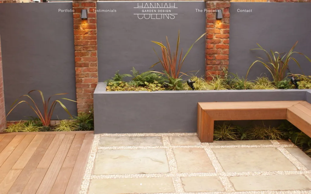 The Hannah Collins Garden Design homepage: an elegant logotype over a landscaped garden